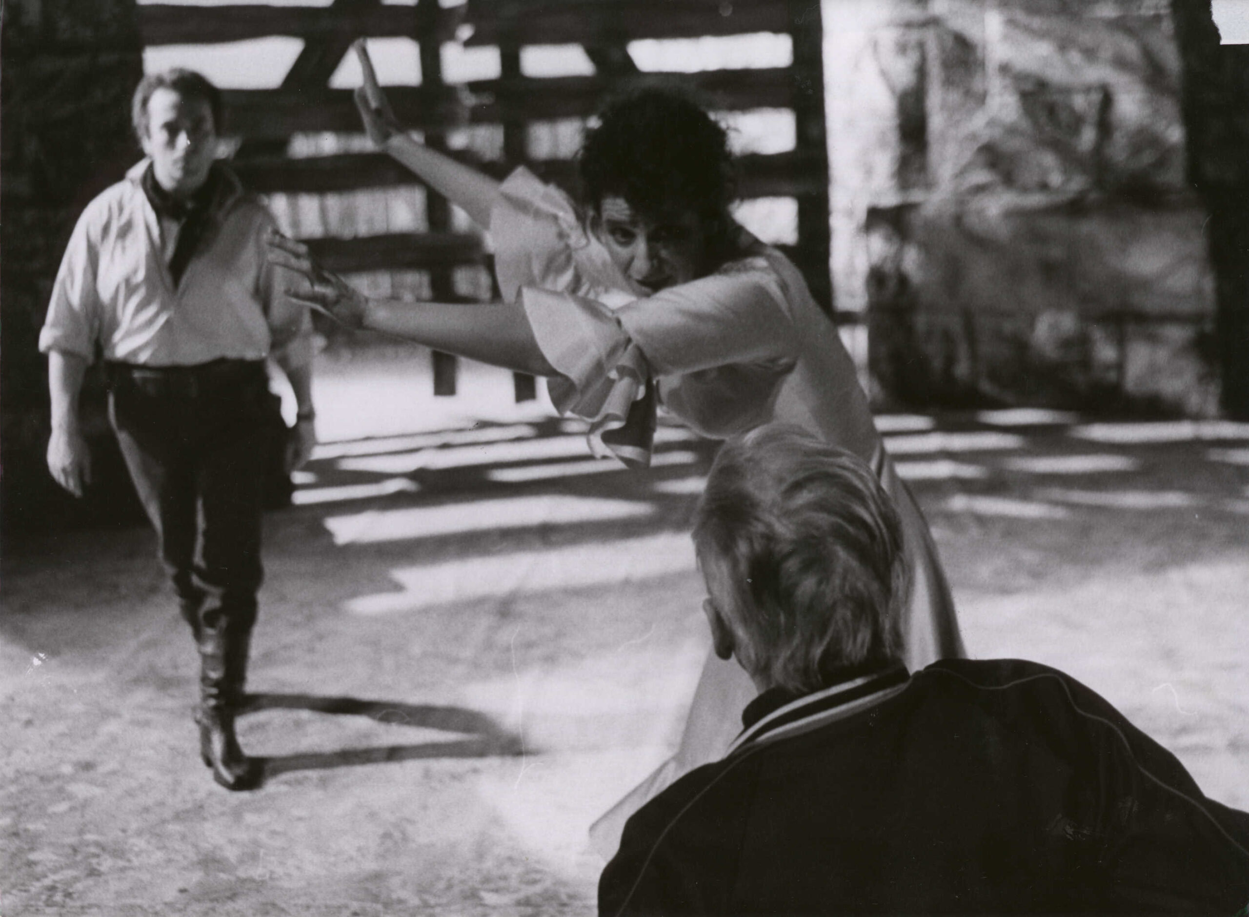 Herbert von Karajan seen from behind rehearsing Carmen with Agnes Baltsa as Carmen and José Carreras as Don José.